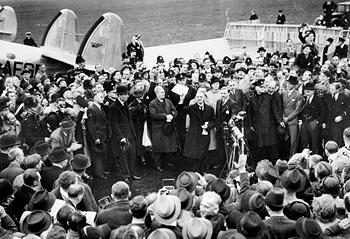 Neville Chamberlain Announces Diplomatic Triumph over the Nazis - 1938